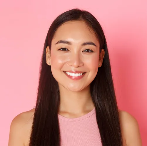 Profile photo of Amelia S. from Miramar, FL — a young Asian woman with long straight black hair, wearing a light pink top, smiling warmly against a soft coral pink background.