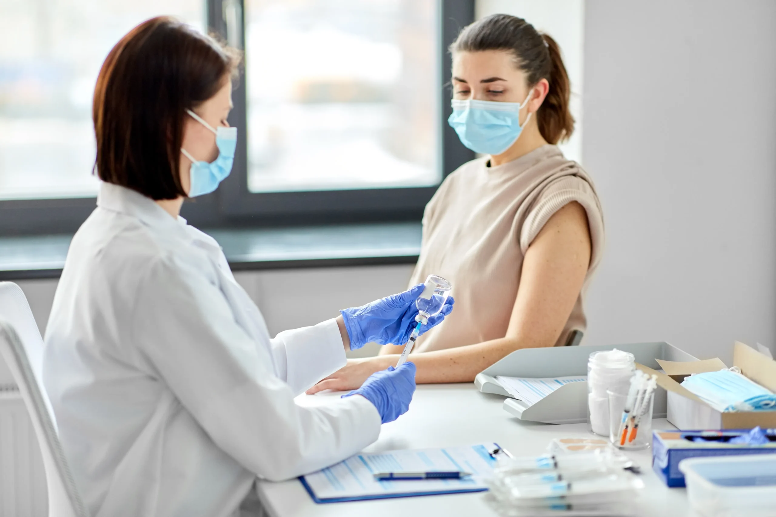 A medical professional helping a patient get PrEP online safely via structured telehealth PrEP services.